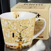 Kép 2/2 - Bögre porcelán 600ml Klimt életfa ekrü