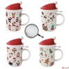 Kép 3/5 - Bögre Porcelán karácsonyi 3,7dl tetővel fémszűrővel,Christmas Frie dobozban