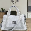 Kép 1/10 - Budmil sporttáska 26 szürke 45x28x20cm 10080125-001261