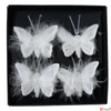 Kép 1/3 - Dekor pillangó 24' csiptetős, organza anyag, fehér 5cm 4db/doboz sdkae