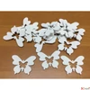 Kép 1/2 - Fa figura pillangó fehér lyukkal 5cmx4cmx3mm 15db/cs