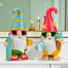 Kép 1/3 - Kerti törpe figura színes 18cm Nyaralós stílusban, magnézia (2-féle) 1db/ár SDGW26
