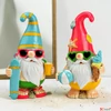Kép 2/3 - Kerti törpe figura színes 18cm Nyaralós stílusban, magnézia (2-féle) 1db/ár SDGW26