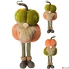 Kép 1/4 - Őszi dekor lplüss egyedi manó álló tökkel a fején 135x135x320mm 2 féle kpm25