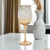 Kép 2/2 - Pohár elegáns kristály 24' borostyán színű arany peremmel csillaggal díszítve 22.6cm sdkae