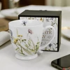 Kép 1/7 - Bögre porcelán 510ml talpas, MELODY Díszdobozban