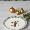 Kép 2/2 - Tányér Porcelán karácsonyi 24' diótörő mintás 3.6cm sdkae